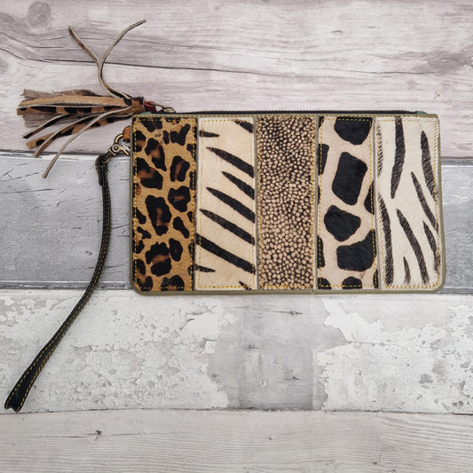 All leather animal print bag with detachable wrist strap.