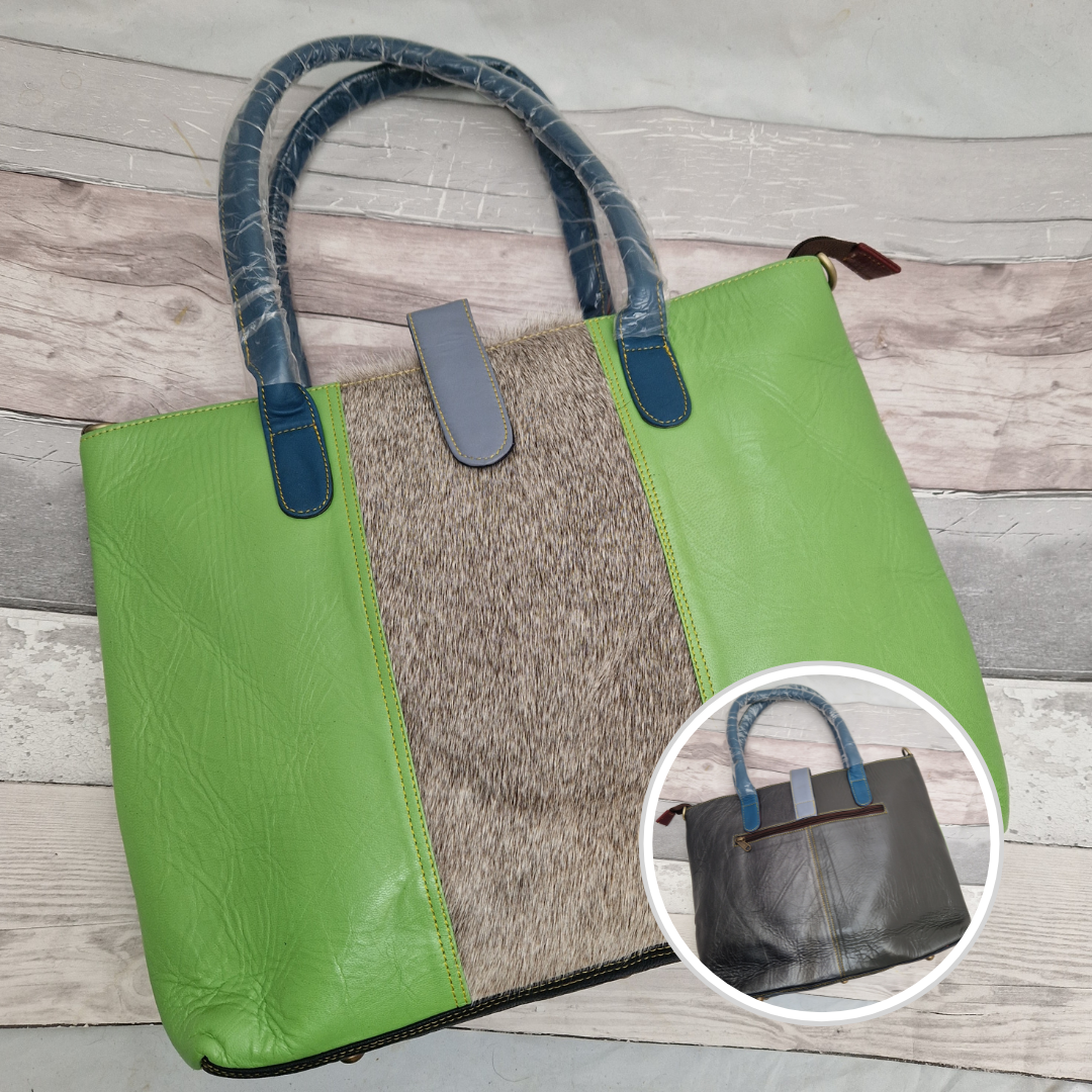 All leather tote bag in apple green with a textured panel of soft grey running down the centre.