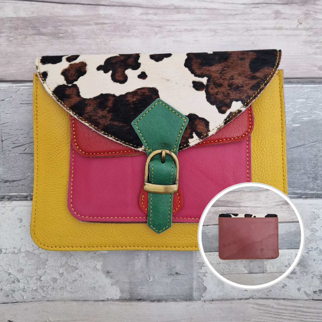 Yellow leather mini satchel style bag with mulit-coloured panels and one of textured cow print.