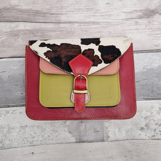 Raspberry Pink leather mini satchel style bag with mulit-coloured panels and one of textured cow print.