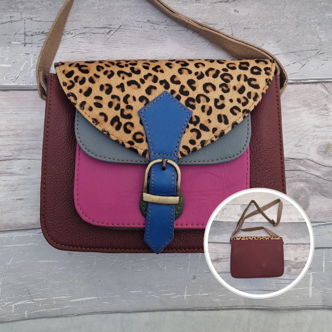 Mini satchel style crossbody bag. All leather made in a mix of colours with a textured panel of leopard print.