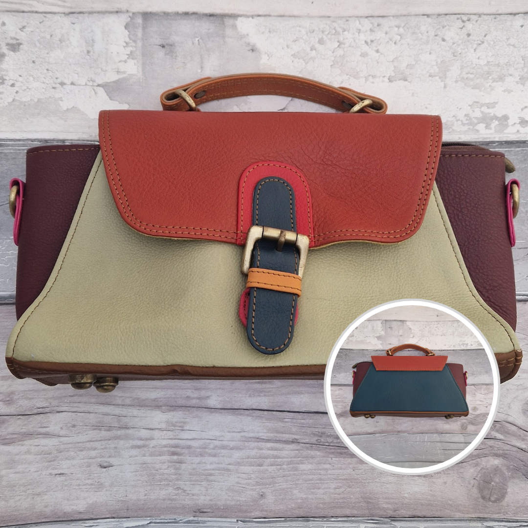 Jhansi style bag is a mini satchel with a top carry handle and a detachable cross body strap. Made from leather off-cuts she is a mix of colours, predominantly brown, rust and lime cream.