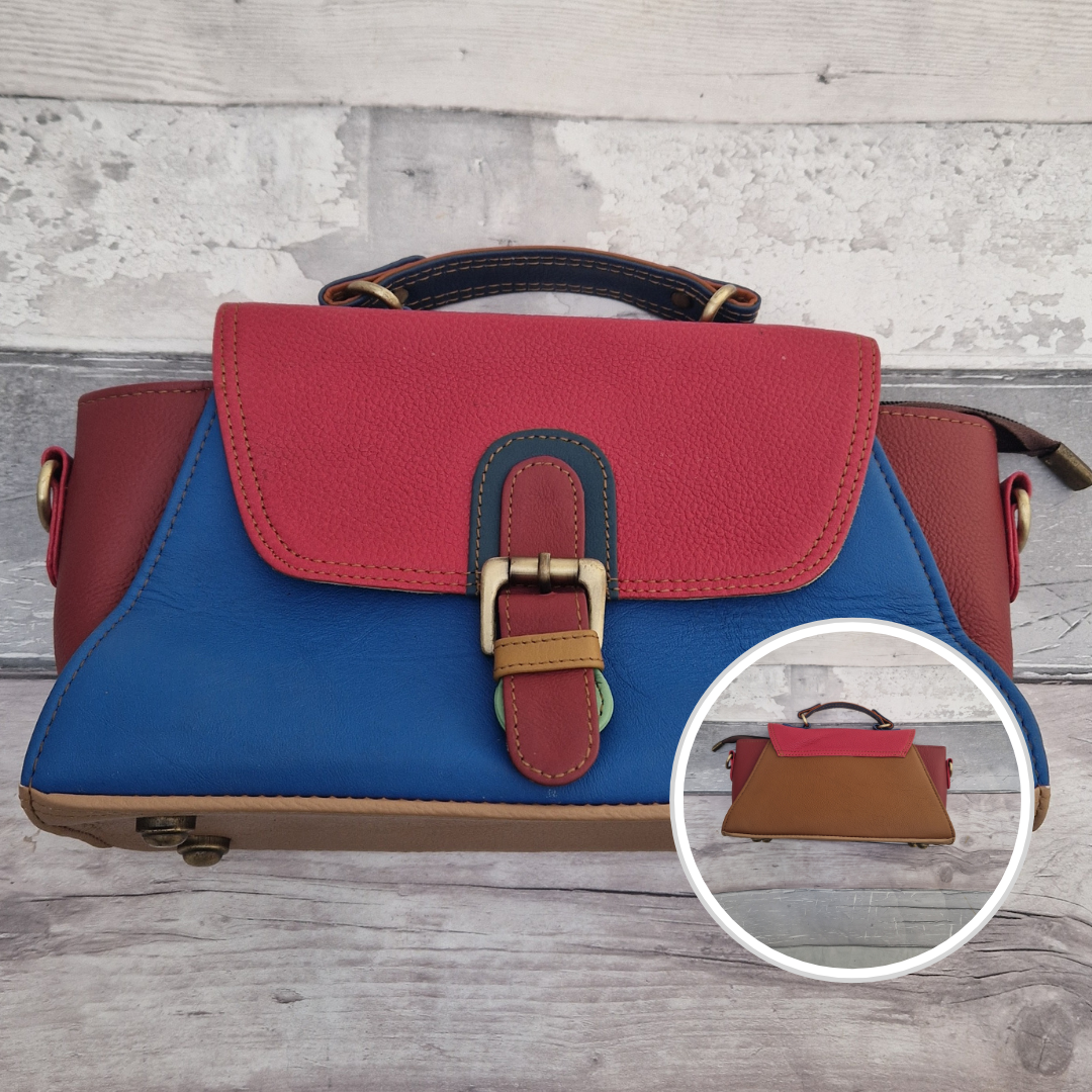 Jhansi style bag is a mini satchel with a top carry handle and a detachable cross body strap. Made from leather off-cuts she is a mix of colours, predominantly brown, red and Royal Blue