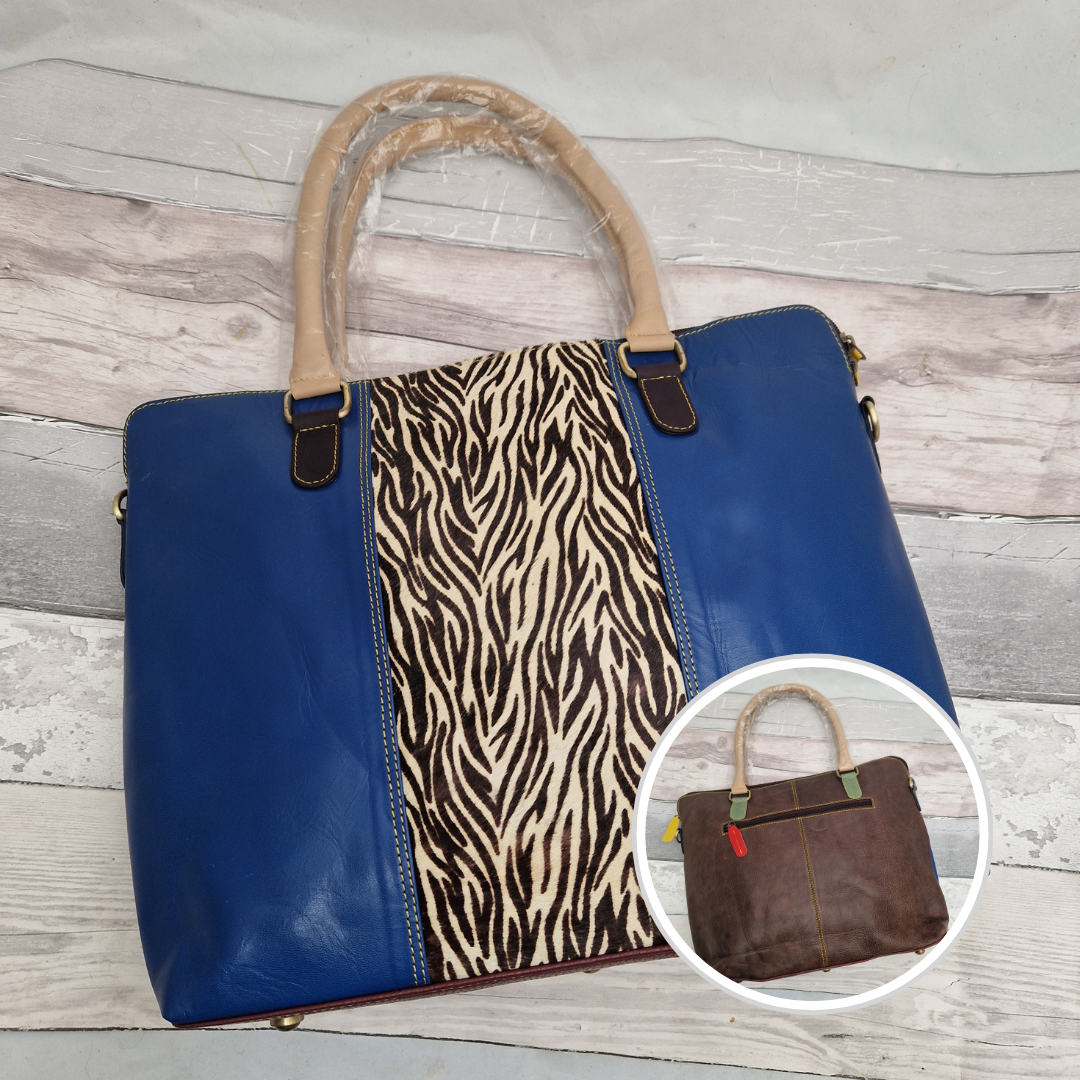 All leather Royal Blue coloured tote bag with an abstract zebra print panel.