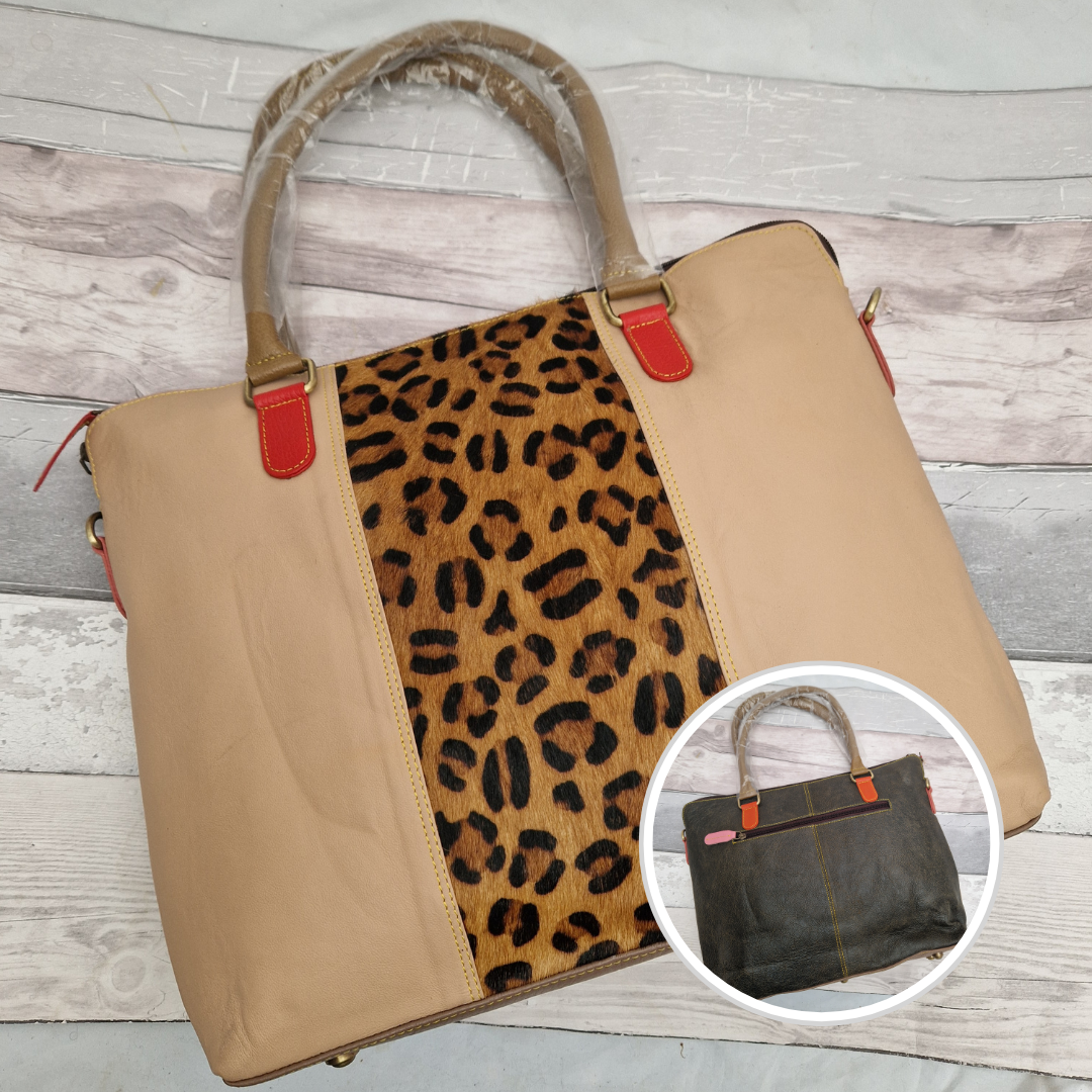 All leather biscuit coloured tote bag with a leopard print panel.