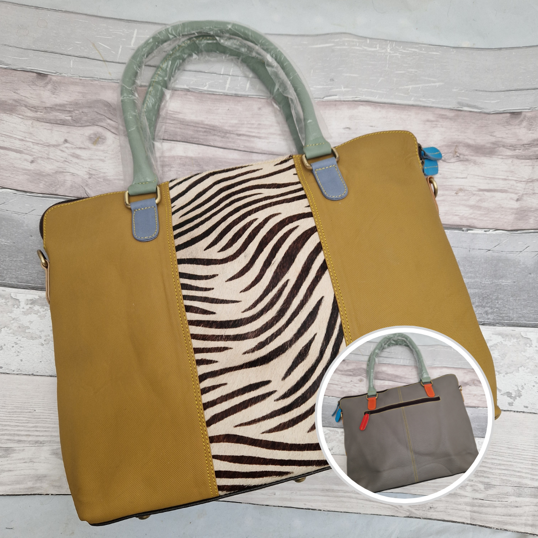 All leather  mustard coloured tote bag with a zebra print panel.