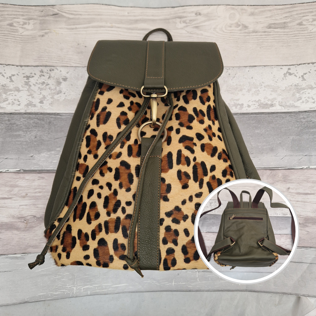 Olive Green leather back pack with textured panels of leopard print.