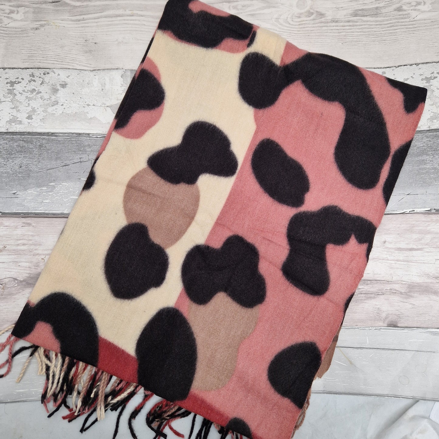 Abstract leopard print scarf in pink, cream, raspberry and mocha colours.