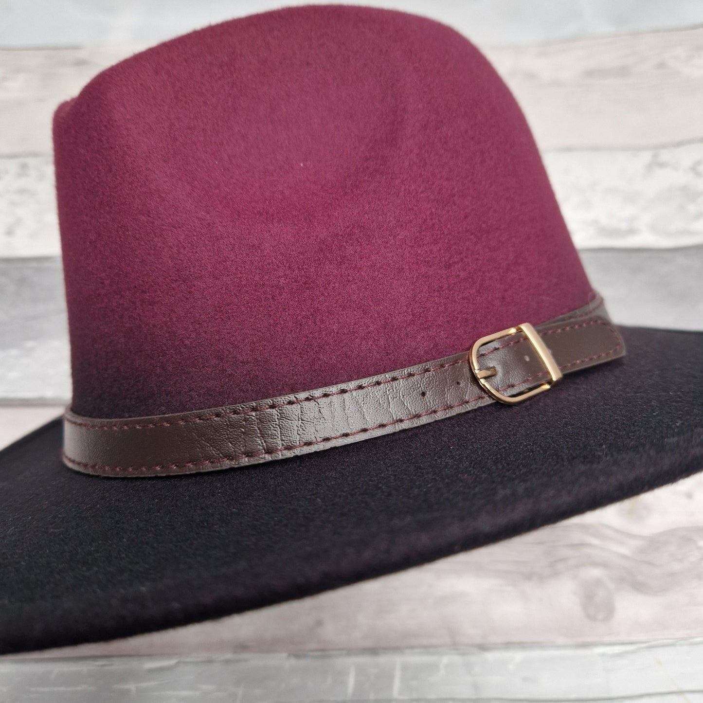 Felt Fedora Hat with a Burgundy Crown, Black Brim and belted band.