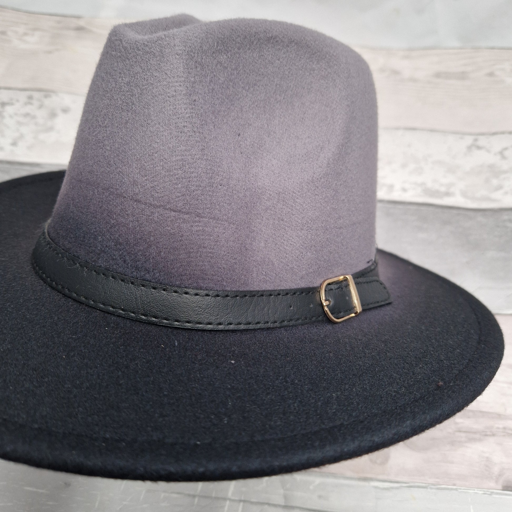 Felt Fedora Hat with a grey crown, black brim and black belted band.