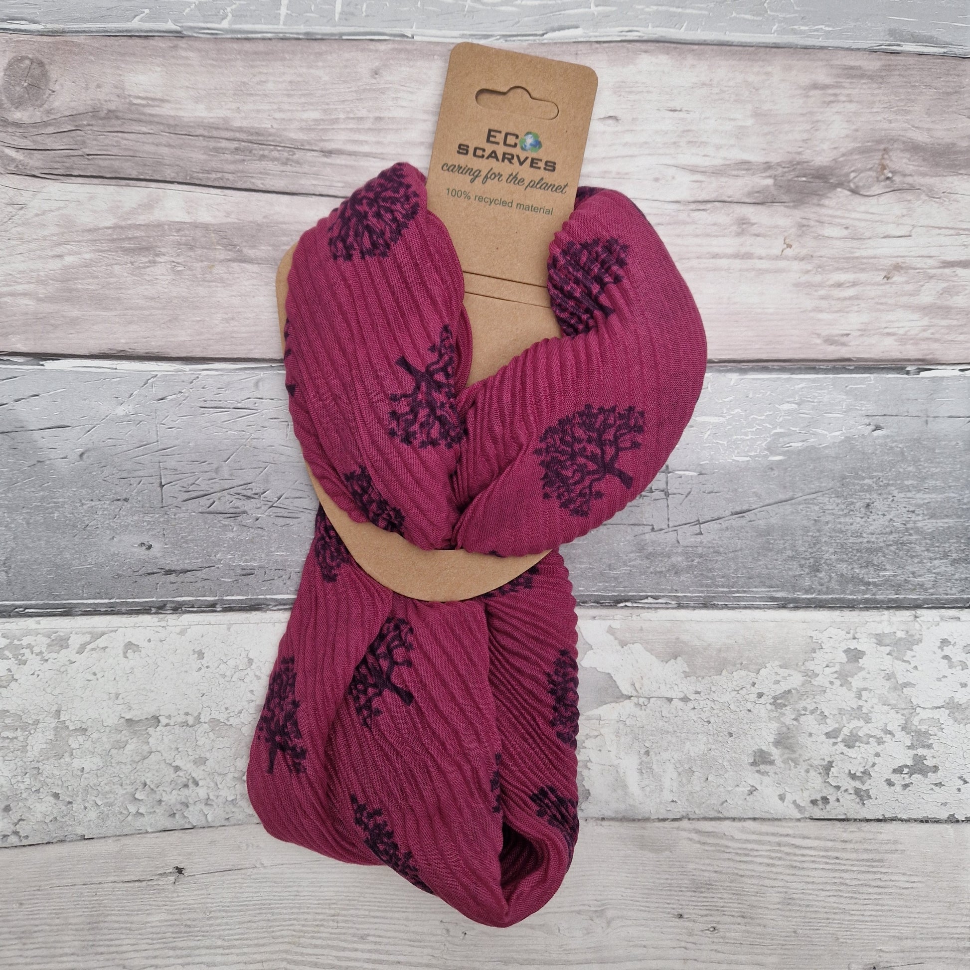 Magenta pink coloured neck scarf with a tree of life print and silver magnetic closers.