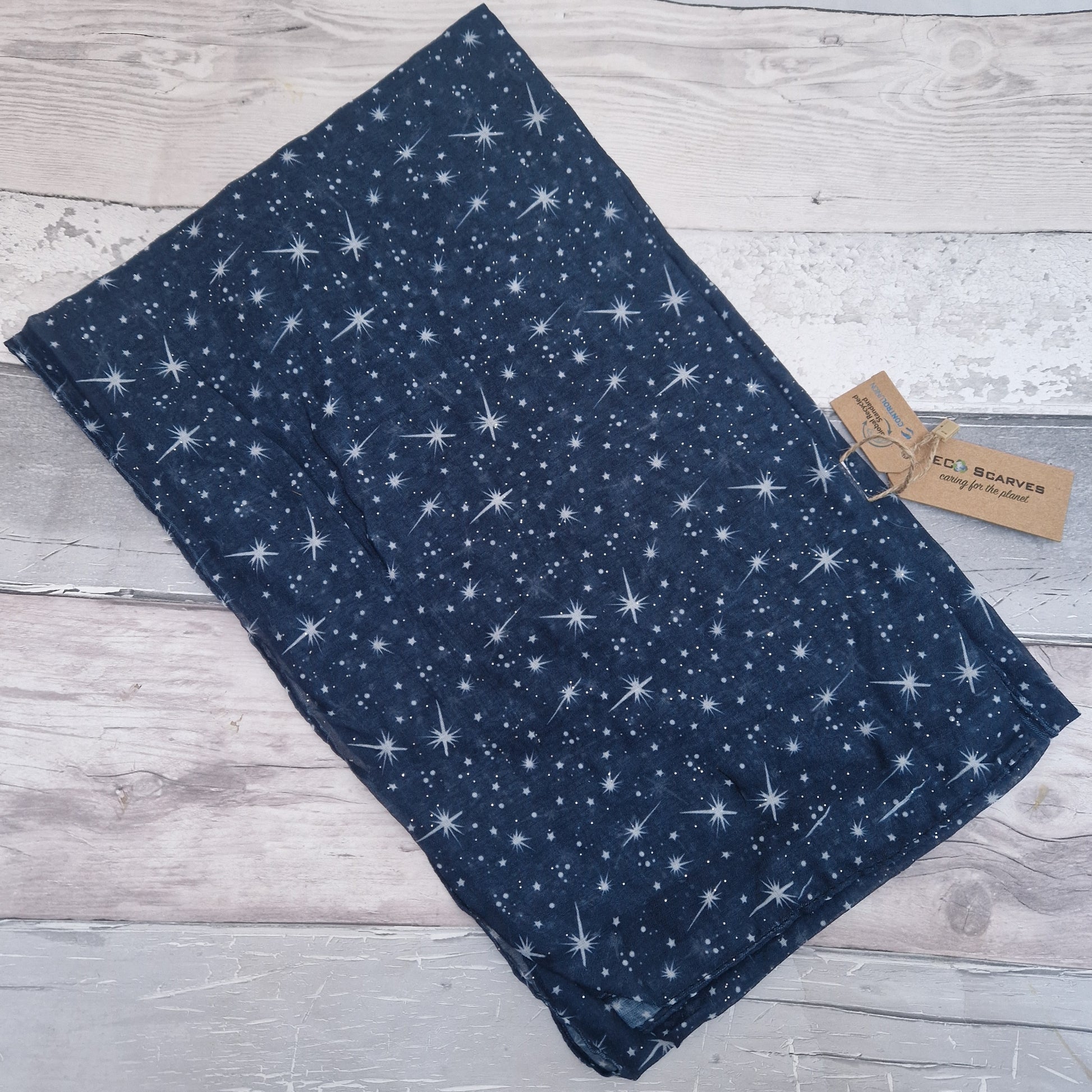 Navy Scarf covered in a star print.