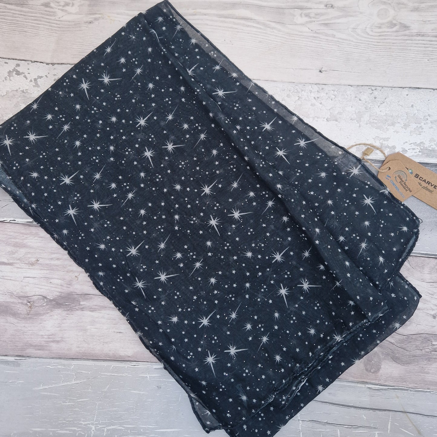 Navy Scarf covered in a star print.