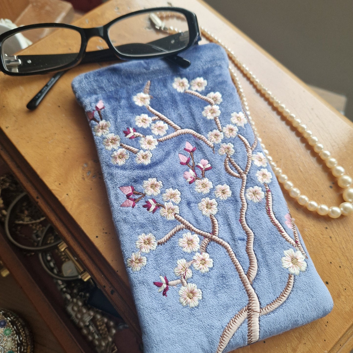 Cobalt Blue velvet glasses case / mobile phone pouch decorated with hand sewn embroidered Cherry Blossom Flowers.