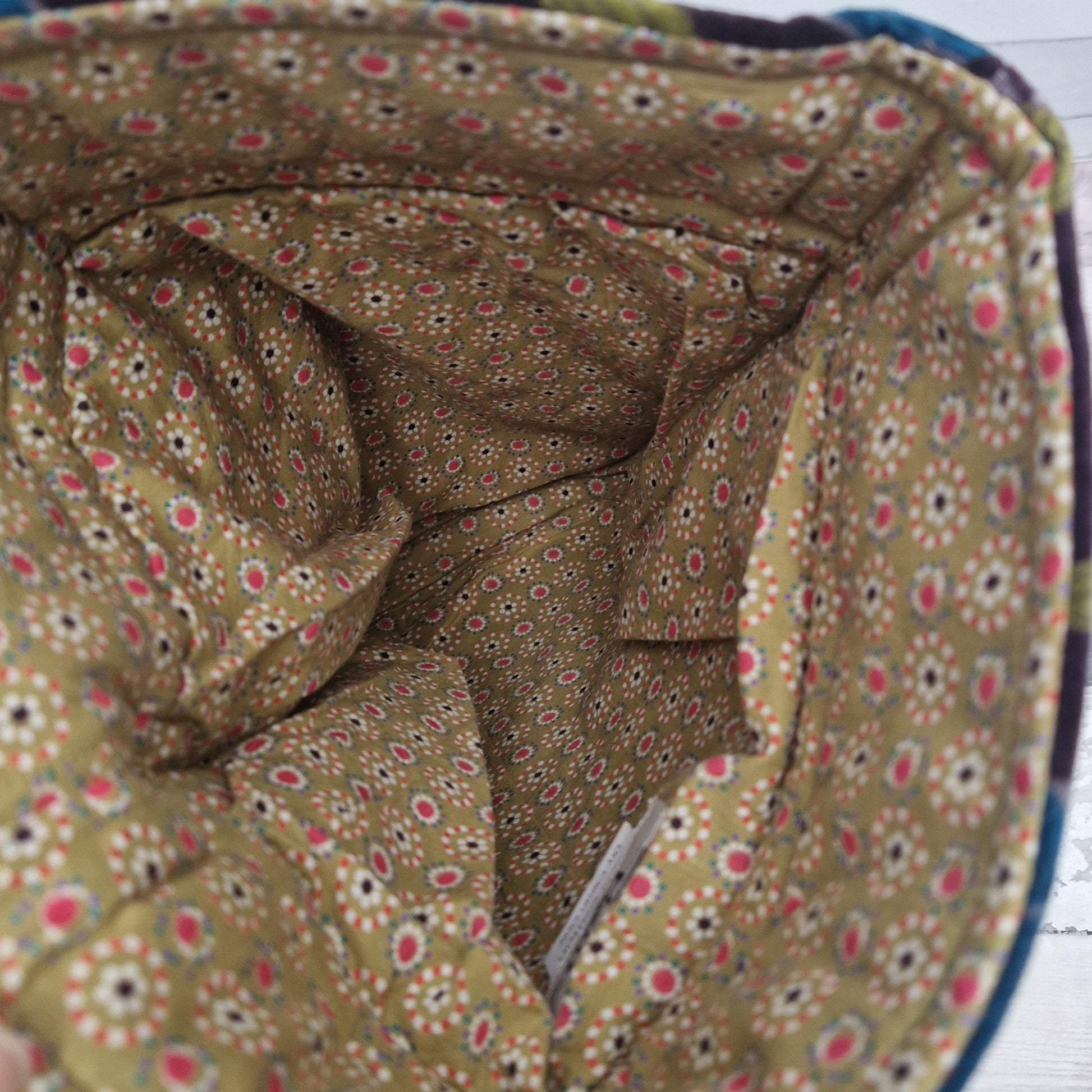 Inside view of our draw string pouch showing a mustard flower coloured lining.