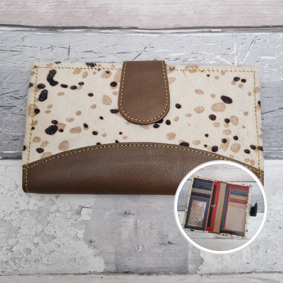 All leather wallet style purse made from multi-coloured pieces with a brown front panel and textured spot print cover.