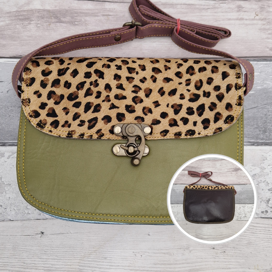 All leather olive green coloured bag with a textured panel of leopard animal print. A brass swivel clasp secured the bag at the front.