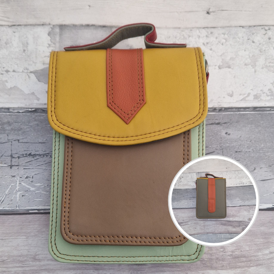 Mini Messenger style bag made from leather in bright mixed colours. With crossbody strap, carry handle and belt loop.