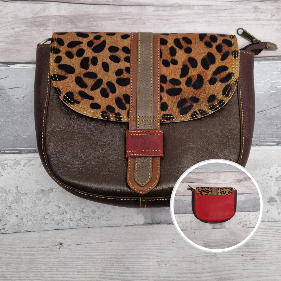 All leather bag with a dark brown coloured front and leopard print textured panels.